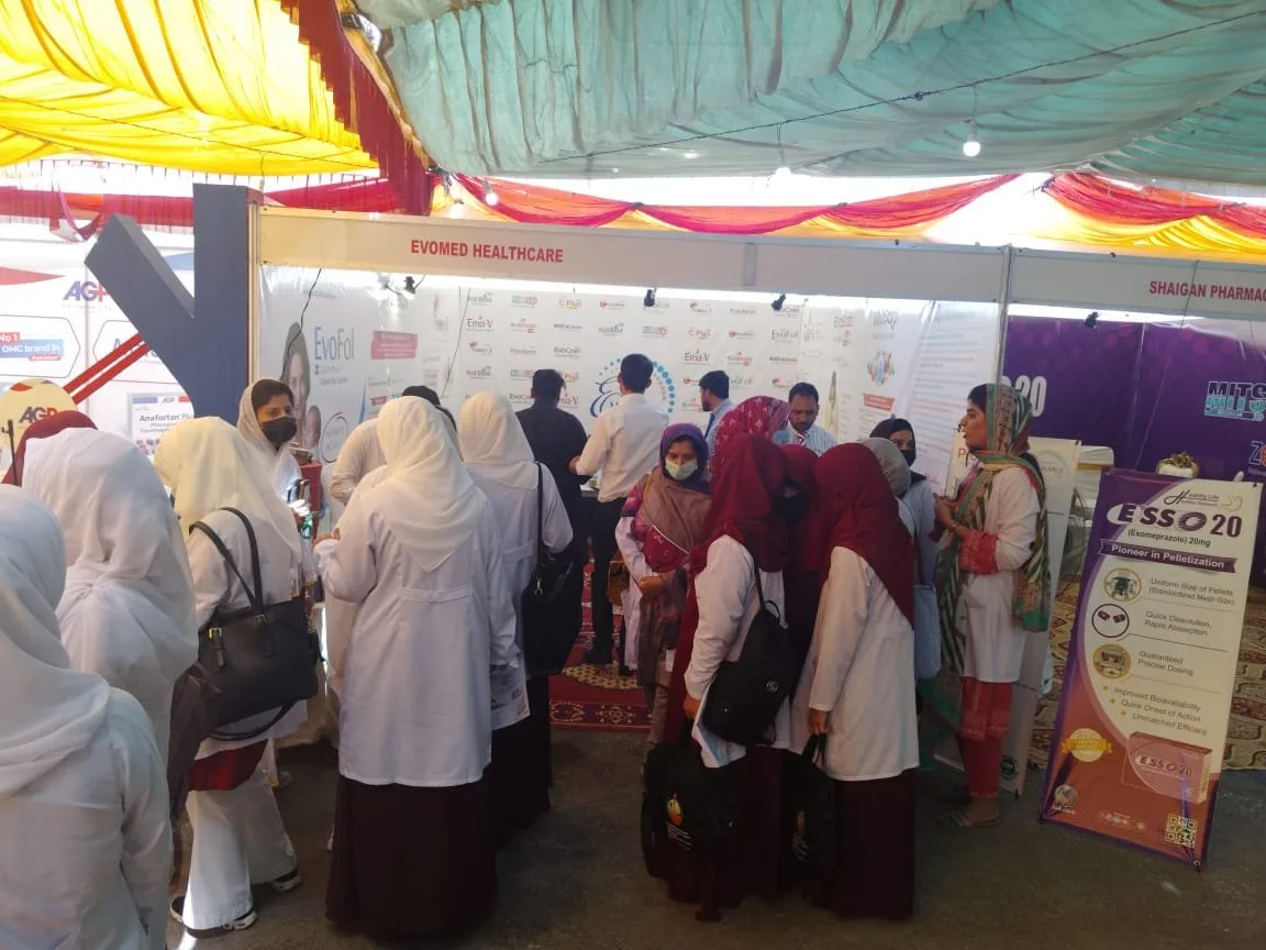 Visitors at the Evomed stall at the conference